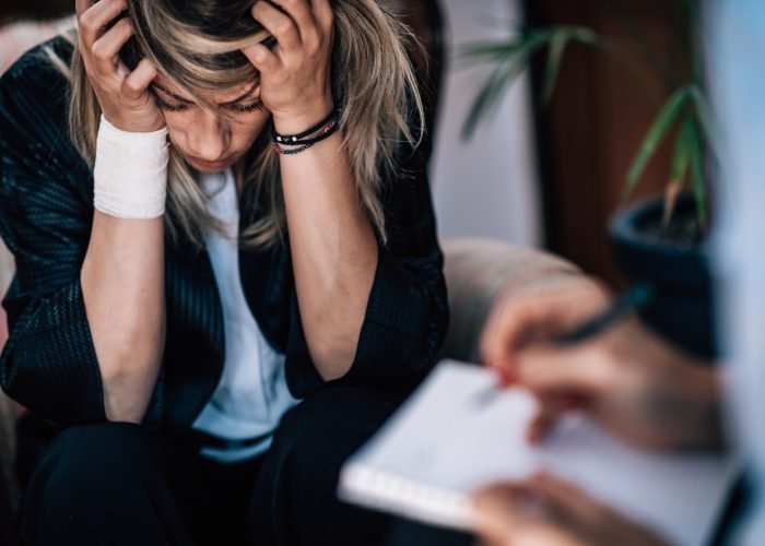 Psychology Concept. Psychotherapist Taking Notes During Session